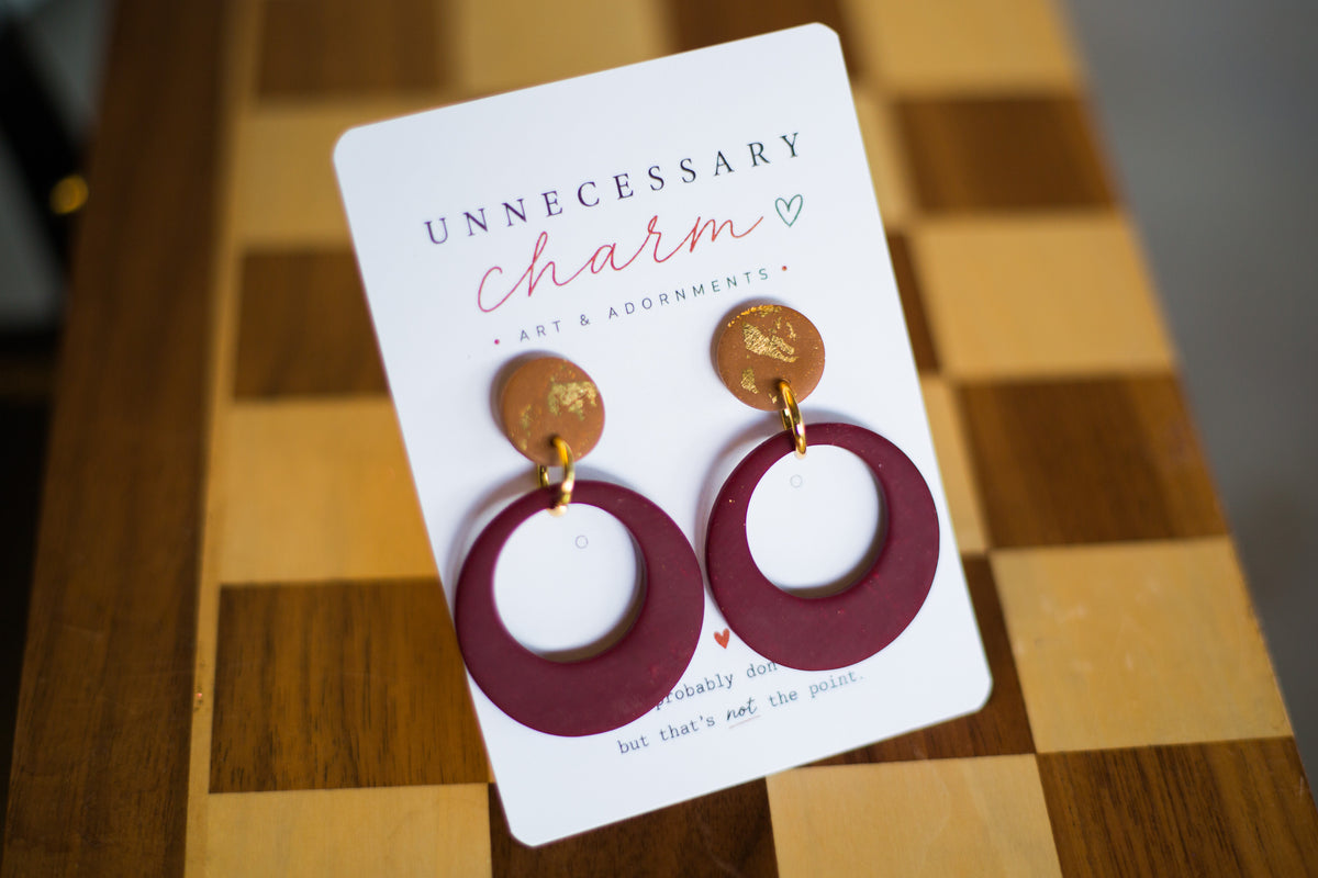 Selene Lion Maroon with Circle Tan Posts