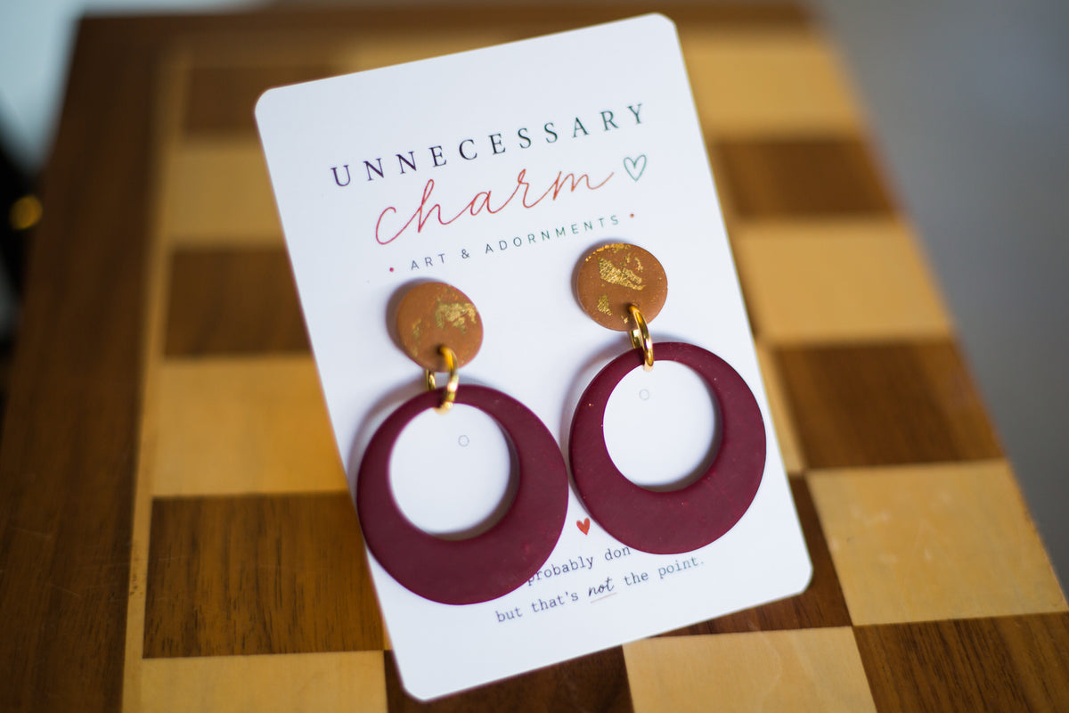 Selene Lion Maroon with Circle Tan Posts
