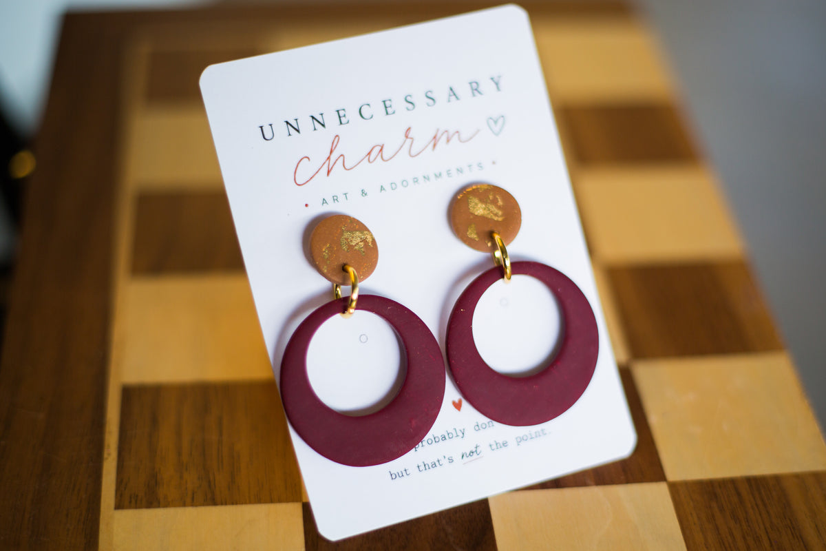 Selene Lion Maroon with Circle Tan Posts